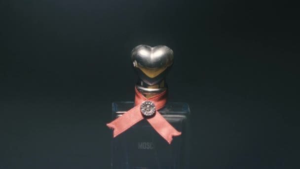 Moschino Perfume Bottle Dark Background — Stock Video