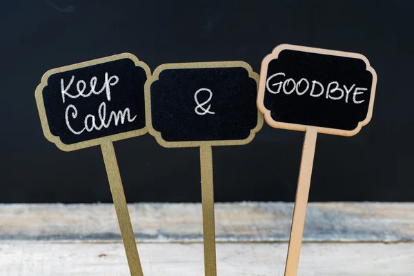 Keep Calm and Goodbye message written with chalk on mini blackboard labels — Stok Foto