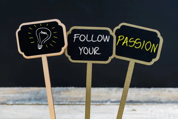 Concept message FOLLOW YOUR PASSION and light bulb as symbol for idea — Stock Photo, Image