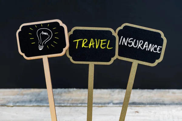 Concept message TRAVEL INSURANCE and light bulb as symbol for idea — Stock Photo, Image