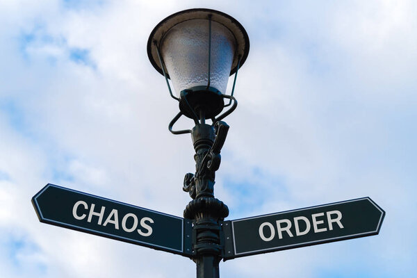 Chaos versus Order directional signs on guidepost