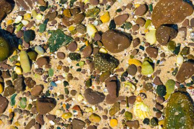 Doğa su kum renkli taşlarla arka plan.