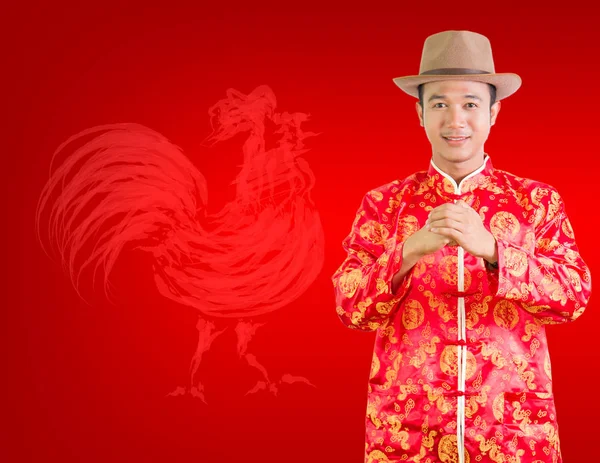Çince geleneksel kıyafet cheongsam veya tang takım elbise ile Asya adam 