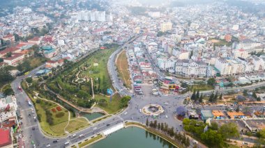 Aerial view from the drone to Dalat city.  Located on the Langbian Plateau in the southern parts of the Central Highlands region of Vietnam clipart