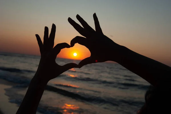 Heart Sign against the sunset, sunrise on the sea — Stock Photo, Image