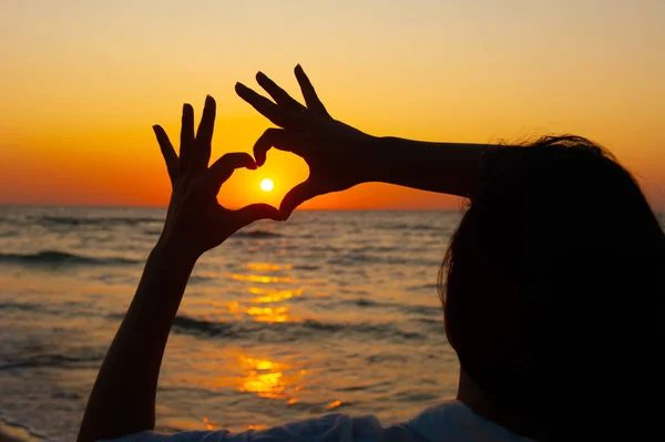 Heart Sign against the sunset, sunrise on the sea — Stock Photo, Image