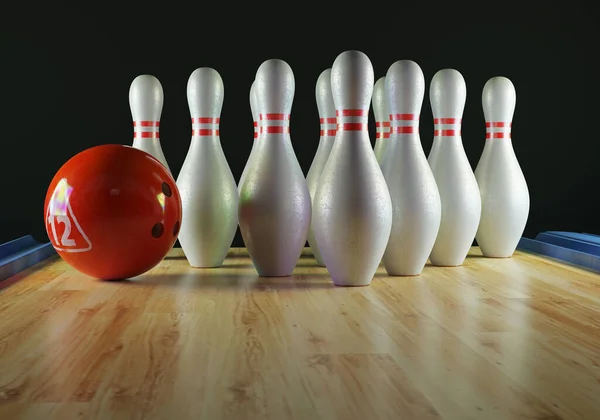 Bowlingové kuželky a bowlingová koule v uličce — Stock fotografie