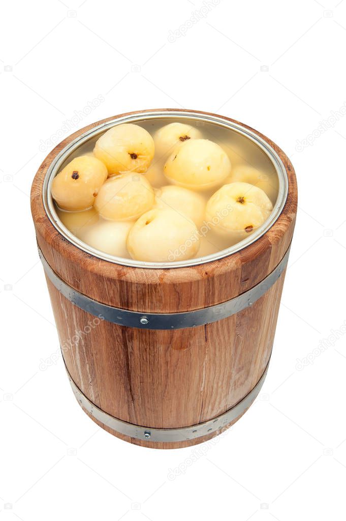 Pickled apples in a barrel