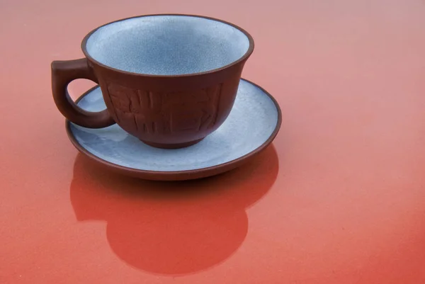 Copo de chá em um pires — Fotografia de Stock