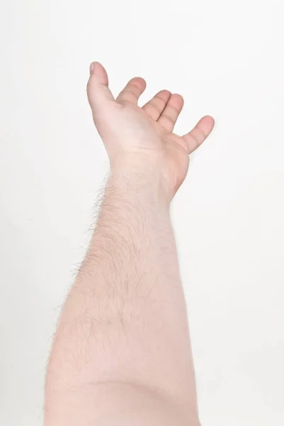 Mão masculina estendida para ajuda — Fotografia de Stock