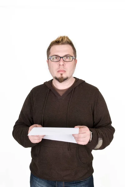 The man is puzzled and reads a document Stock Image