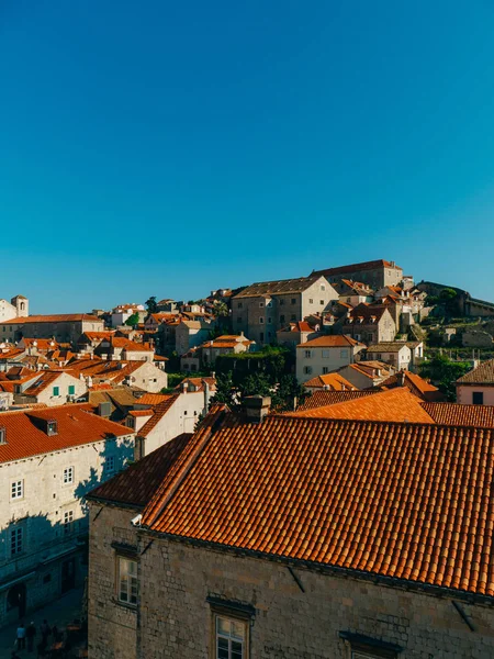 Dubrovnik Old Town, Croatia. Tiled roofs of houses. Church in th