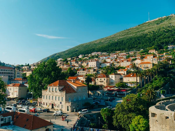 Dubrovnik Old Town, Croatia. Tiled roofs of houses. Church in th — Stock Photo, Image