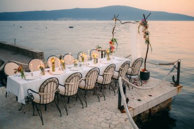 Wedding dinner by the sea. Wedding banquet at the sea. Donja Las clipart
