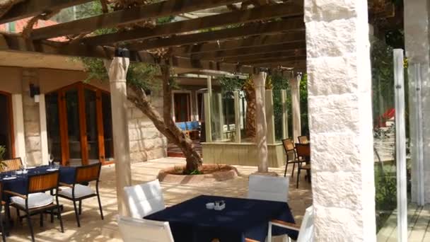 Tables in cafe on the street. Street Cafe. Restaurants in Monten — Stock Footage Tables in cafe on the street. Street Cafe. Restaurants in Monten Royalty Free Stock Video