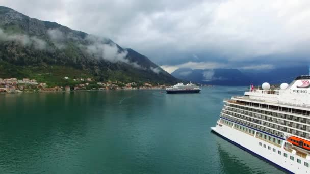 Huge cruise ship in the Bay of Kotor in Montenegro. Near the old — Stock Video