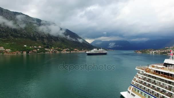 Huge cruise ship in the Bay of Kotor in Montenegro. Near the old — Stock Video