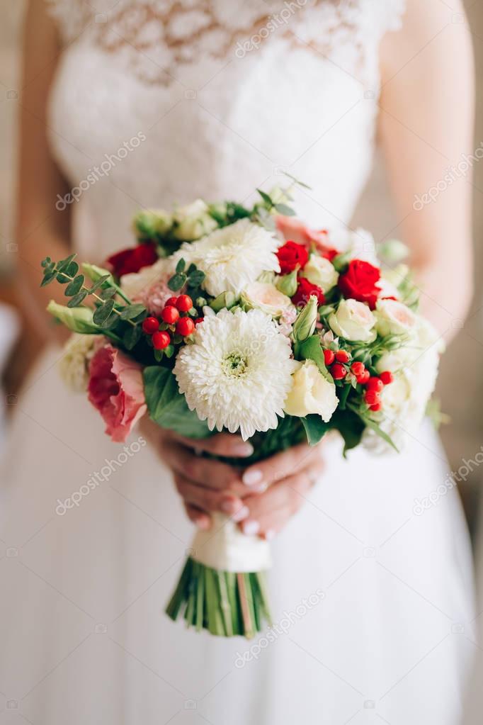Wedding bridal bouquet of roses, chrysanthemums, Eucalyptus Baby