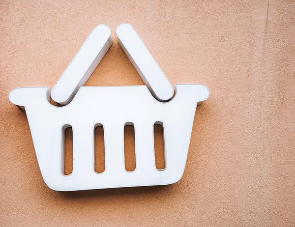 Advertising the grocery store. Shopping basket. A sign of the st