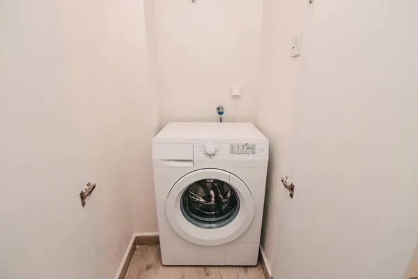 Washing machine in apartment, close up. Storage room for washing — Stock Photo, Image