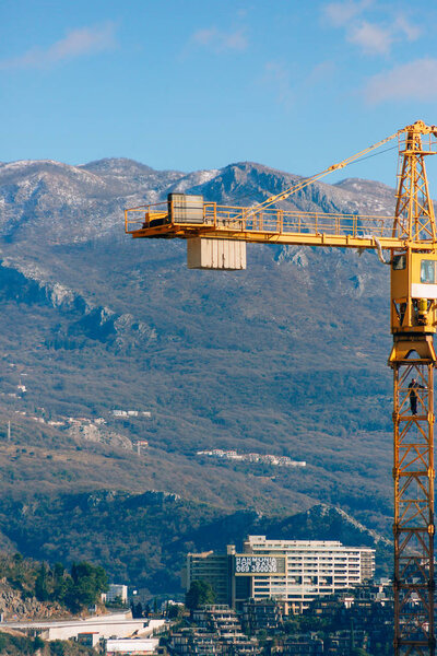 Construction of a multi-storey building. The crane is working. B