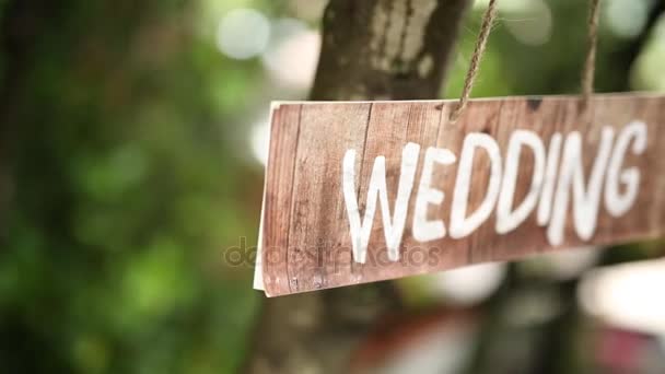 The tablet Wedding on an olive tree. Wedding decorations. — Stock Video