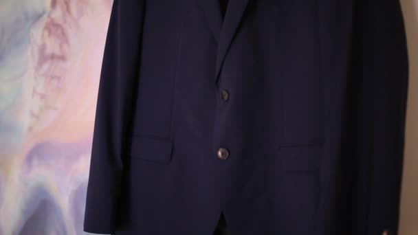 Close-up of buttons on a mans jacket. The wedding dress of the — Stock Video