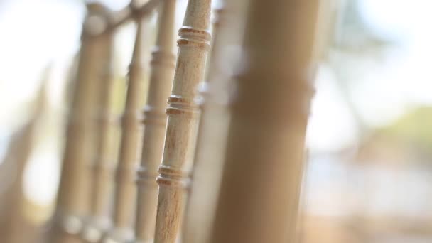 Chairs at a wedding ceremony. Decorated with flower arrangements — Stock Video