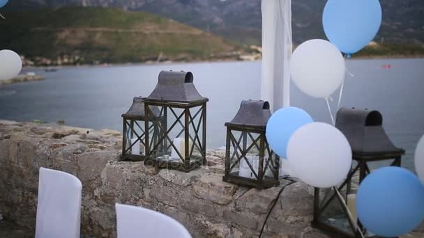 Velas en lámparas de vidrio. Decoraciones de boda. Boda en Monteneg — Vídeos de Stock