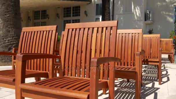 Wooden chairs on the street. Chairs for cafe — Stock Footage Wooden chairs on the street. Chairs for cafe Royalty Free Stock Video