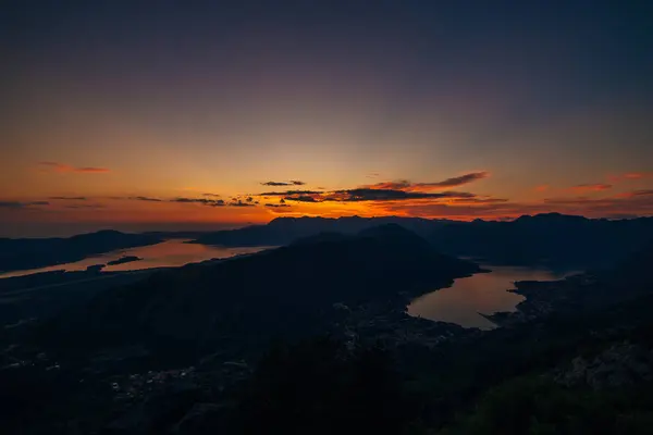 Sunset in Montenegro over the mountains and the sea — Stock Photo, Image
