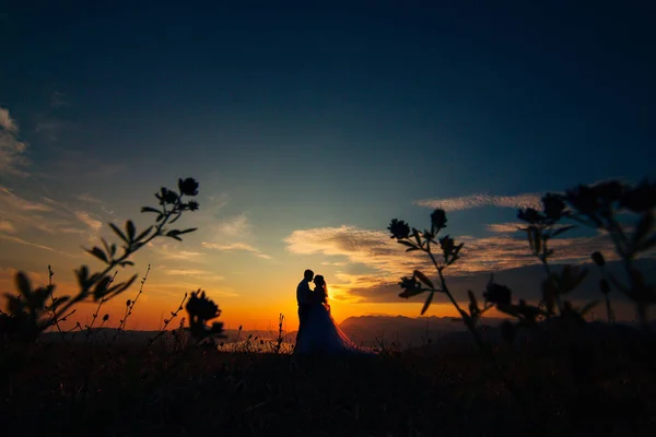 Siluetas al atardecer en el Monte Lovcen — Foto de Stock