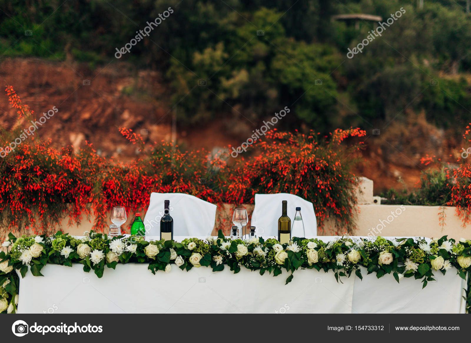 Flower Compositions On The Wedding Table In Rustic Style Wedding