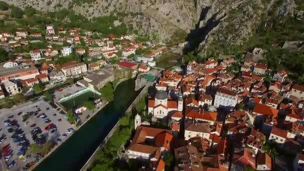 The Old Town of Kotor. Flying over the city. Aerial survey by a — Stock Video