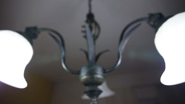 Chandelier in the apartment. A beautiful chandelier on the ceili — Stock Video