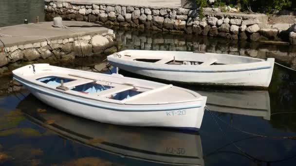 Wooden boats on the water. In the Bay of Kotor in Montenegro. Ma — Stock Video