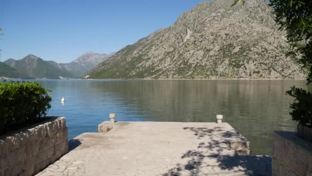 Mooring in the Bay of Kotor, Montenegro. Bay among mountains. Bo — Stock Video