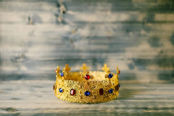 Golden crown encrusted with precious stones for wedding in church — Stock Photo, Image