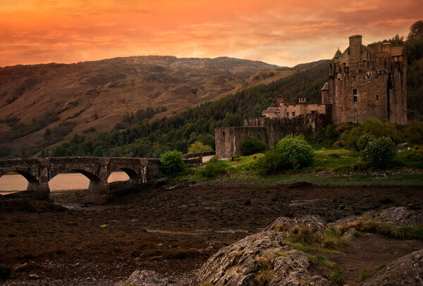 Eilean Donan Castle, a picturesque castle on a small tidal island where three sea lochs meet, in the village of Dornie.