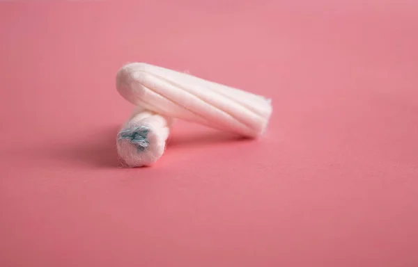 Medical female tampon on a pink background. — Stock Photo, Image