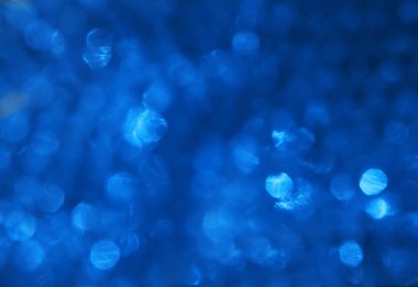 Yanıp sönen yıldızlı mavi arka plan. Tatil soyut dokusu. 