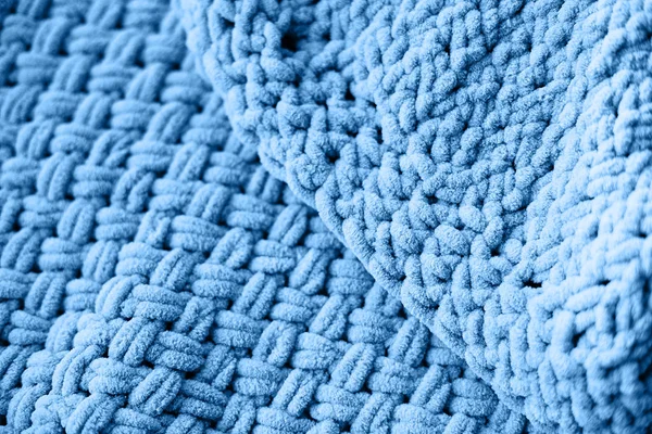 Kék kötött takaró textúrája. Kockás merinó gyapjú. — Stock Fotó