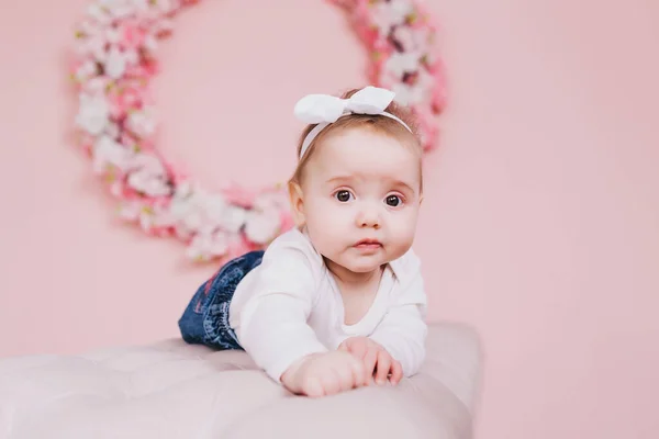 Image of sweet adorable baby girl with pink flowers — Stock Photo, Image