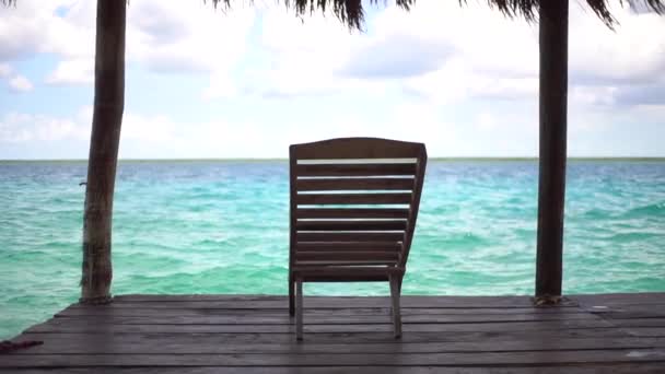 Chair in front the sea — Stock Video