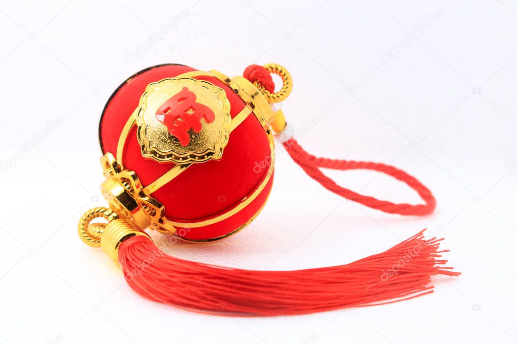 Red spherical shape lantern for Chinese New Year decoration over white background.  The Chinese word means fortune.