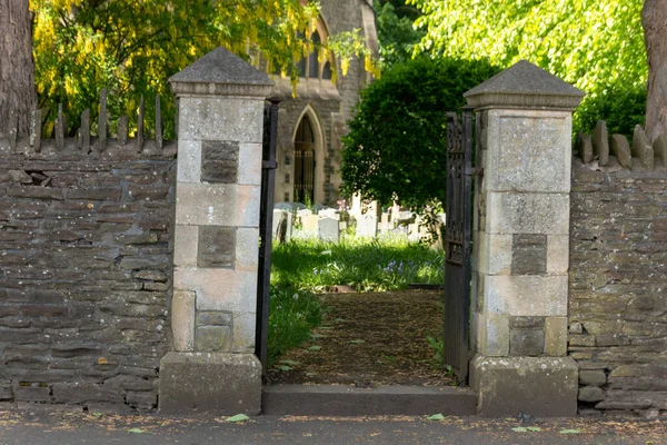 Close View Two Stone Pillars Attached Stone Wall Leads Church — Stock Photo, Image