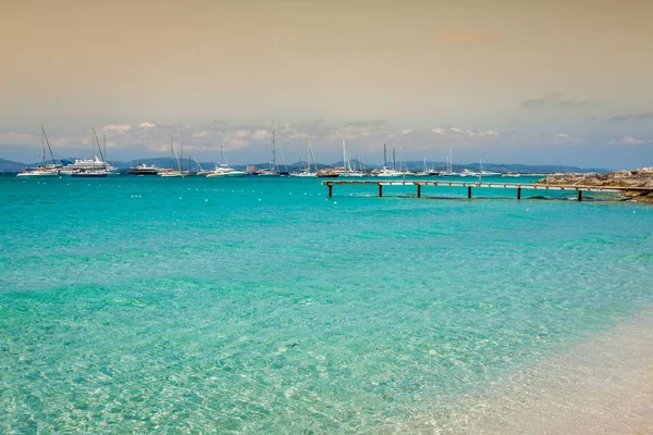 Formentera tropical Mediterranean sea wooden pier in Illetes bea — Stock Photo, Image