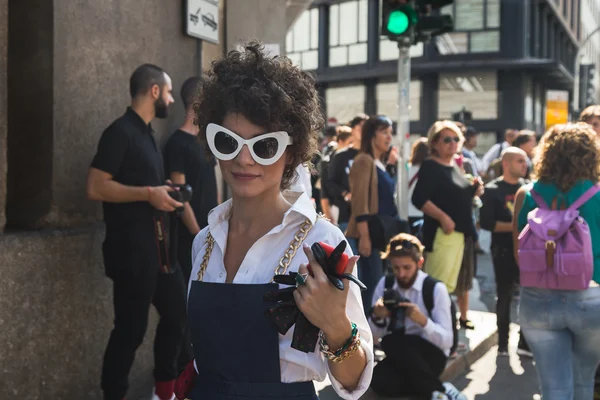 Fashionable woman posing during Milan Fashion Week Stock Photo