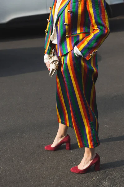 Fashionable woman posing during Milan Women 's Fashion Week — стоковое фото