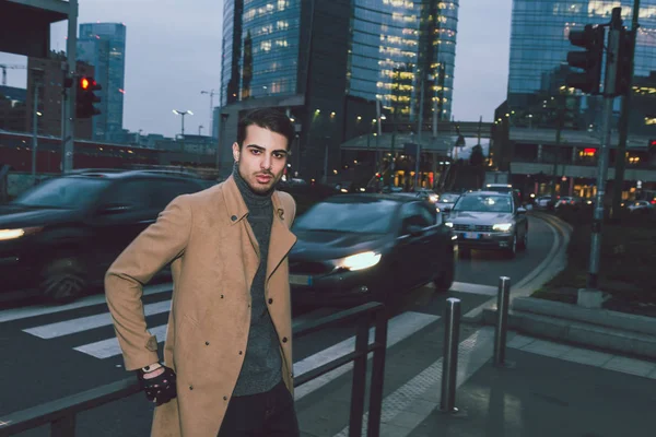 Beautiful young man posing at dusk — Stock Photo, Image